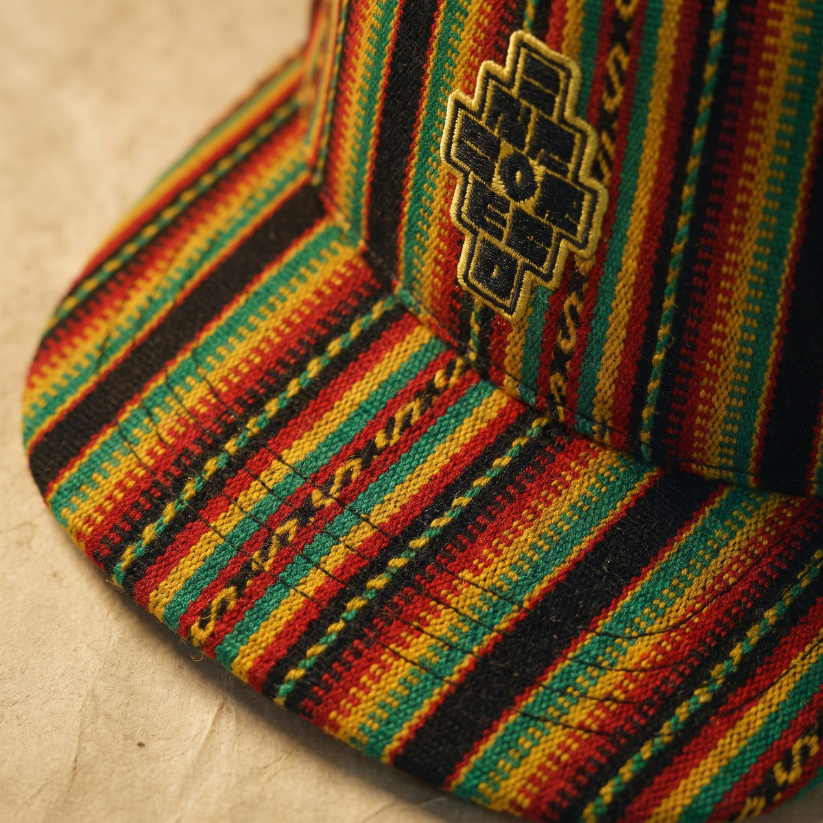 El Alto — handwoven brim, macro
