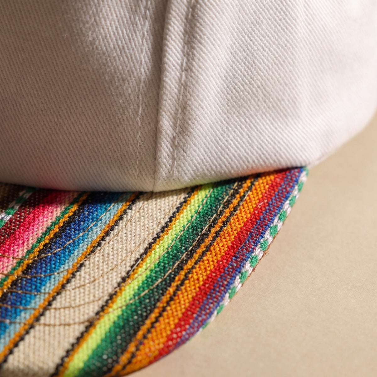 Paracas — handwoven brim, macro